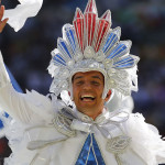 A PERFORMER WAVES DURING THE CLOSING CEREMONY FOR THE WORLD CUP
