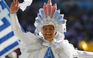 A PERFORMER WAVES DURING THE CLOSING CEREMONY FOR THE WORLD CUP