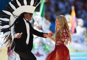 Musician Carlinhos Brown and singer Shakira Dance Perforns during The Closeing Ceremony